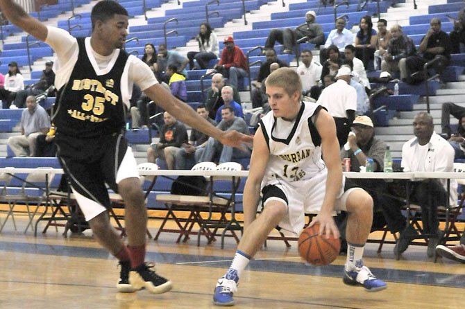 Fairfax senior Zack Burnett, right, scored four points for the Suburban All-Stars team during the 40th Annual Capital Classic on Sunday at T.C. Williams High School.