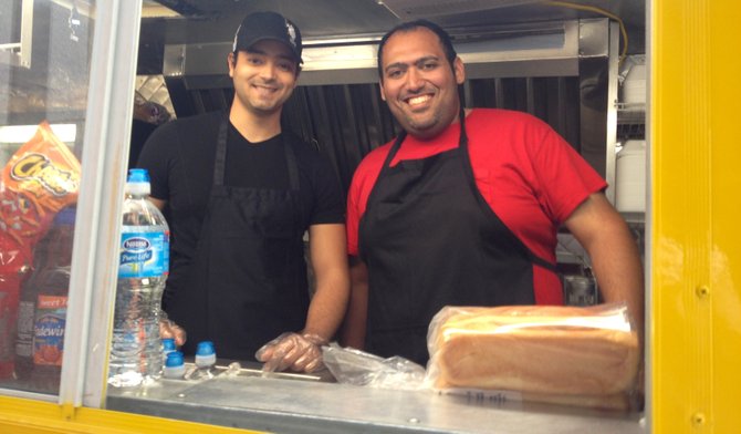 Amir Mohammad, right, and his brother Ayman Mohammad own Baba's Big Bite food truck.