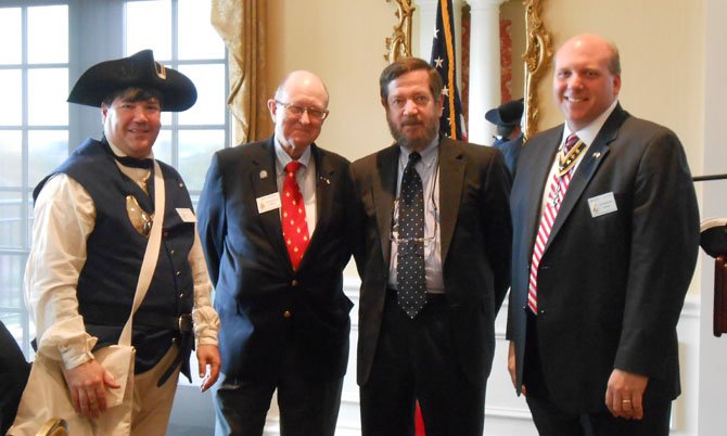 Commonwealth's Attorney S. Randolph Sengel, second from right, receives the Law Enforcement Commendation Medal April 27 from the George Washington Chapter of the Sons of the American Revolution. Pictured from left: Scott B. Stephens, co-chair, Public Service and Heroism Awards; Col. Jack T. Pitzer, Ph.D., CPPO, co-chair; S. Randolph Sengel, Commonwealth's Attorney; and Michael Elston, Esq., chapter president.
