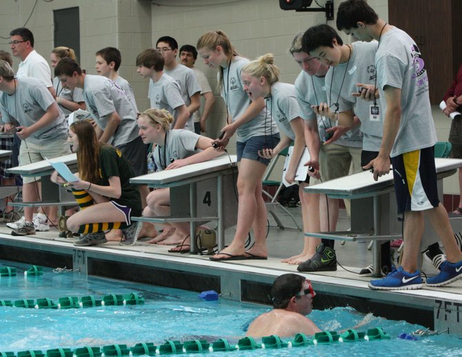 Potomac Marlins swimmers from throughout Fairfax County volunteered at the recent Special Olympics Swim Meet, hosted by The Potomac Marlins and held at George Mason University.
