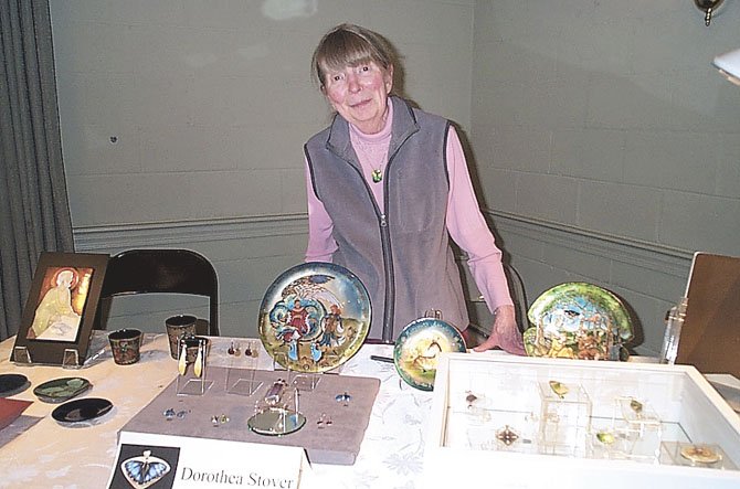 Dorothea Stover of Arlington, enamellist, at the April 19 art show.
