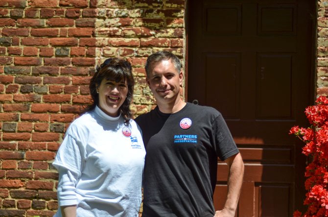 Colvin Run Mill volunteer Karen Hogan and Fairfax County Park employee Matthew Kaiser at the Millers House.