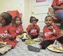 The pre-school students enjoy a light lunch before ...