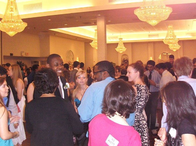 Students have a good time chatting on the dance floor between songs at last week’s Day Prom. 