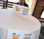 Susy Rothschild, a volunteer, mans the McLean Senior ...
