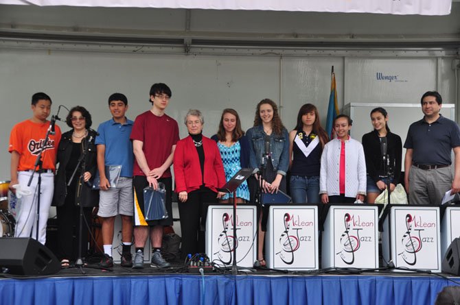 From left, Teen Character Award winners Ben Wang, McLean Citizens Association President Sally Horn, Alex Soltany, William Davis, school board member Janie Strauss, Alex Riddell, Anna Pope, Charlotte Heffelmire, Jade Davis, Azeta Peters and Ben Wiles of Fairfax County. Not pictured are winners Bel Kelly-Russo, Cameron Thompson and Arjan Peters. 