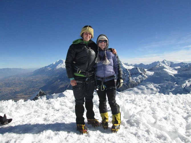 Alison Foley and her sitemate Keren Eyal on top of Vallunaraju, a peak they climbed together.