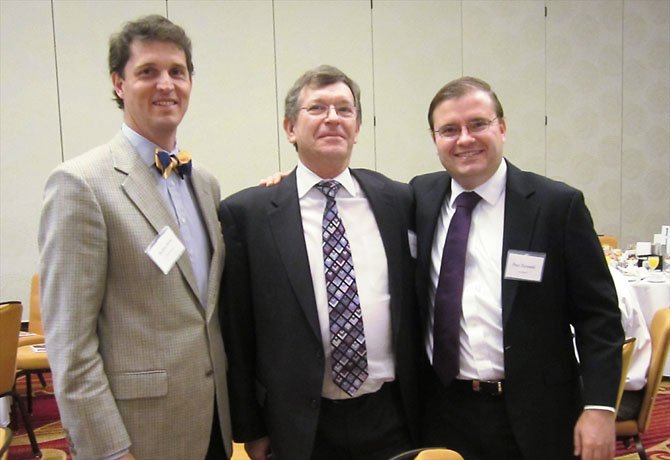 Burton White (Excella), David Legge (CliftonLarsonAllen) and Paul Zurawski (Homestretch) at the breakfast.