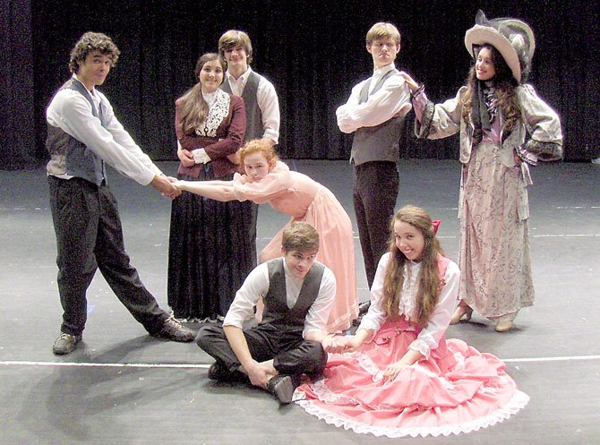 Posing in character are (back row) from left Marissa Kovach, Will Park, Doug Klain and Alex Nicopoulos; (middle) Jo Coenen and Amanda Harvey; and (front) Derek Yost and Margaret Murphy in Fairfax High’s “Hello, Dolly.”