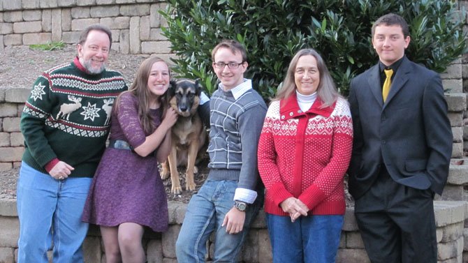 The Stach family (from left) are David, Liesl, dog Frieda, Dieter, Trish and Paetr.