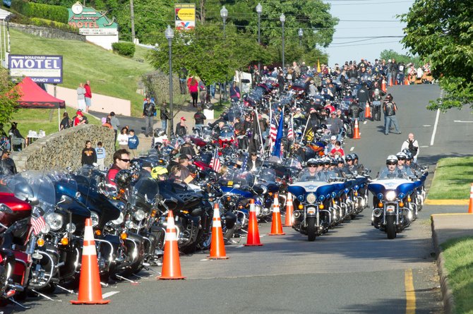 On May 26, the City of Fairfax motor squad prepares to escort the estimated 4,000 bikers in the Patriot Harley-Davidson Ride of the Patriots through Fairfax on their way to participate in Rolling Thunder’s Ride for Freedom.

