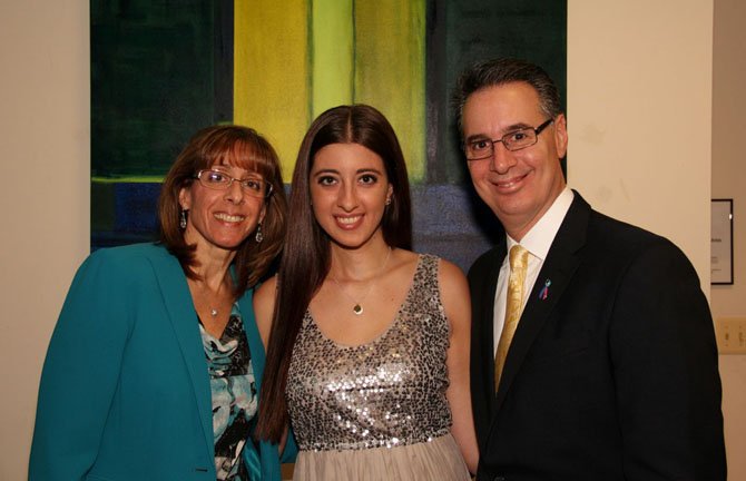 Nikki Ferrarro (center) with parents Sharon and Michael Ferraro.