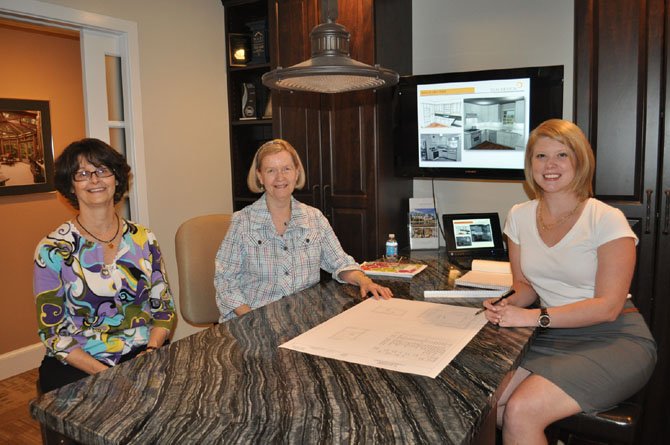 Connie Sorrentino, 70, (center) reviews plans to introduce aging-in-place innovations into her kitchen and several bathrooms with Sun Design Remodeling’s Mindy Mitchell (left) and designer Kim Kruskamp.