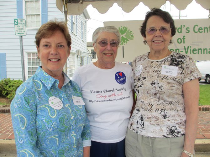 Casey Tarr, Kathy Tugendhat and Jean Bastien, volunteers at the Shepherd Center of Oakton-Vienna, man the SCOV tent at ViVa! Vienna! over Memorial Day weekend.