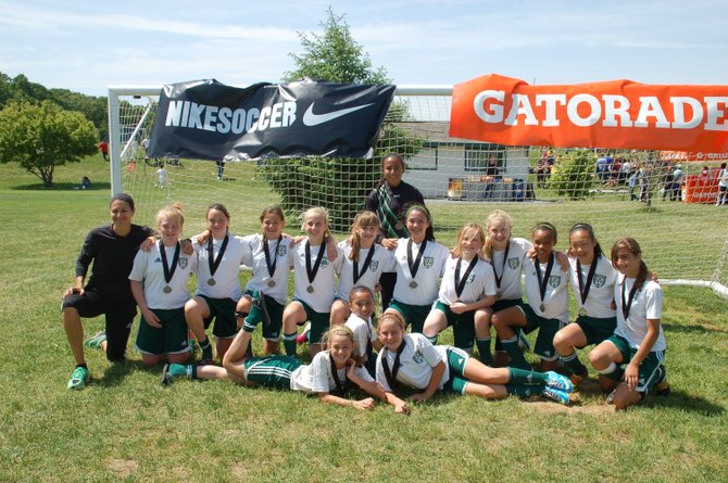 McLean players from right to left: (front row) Aubrey Donohue, Alex Driscoll, Ginevra Augustine; (second row) coach Nicci Wright, Sophia Falco, Claire McMahon, Zoe Scoric, Hollis Cutler, Kendall Robertson, Jordan Beverina, Kiefer Williamson, Lindsay Blum, Nikki Debayo-Doherty, Ashley Chun, Maria Purcell; and (back row) Cayla White.