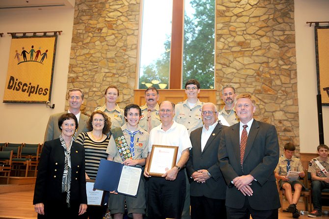 Front row, from left: County Board Chairman Sharon Bulova, Sarah, Chris and Bill Mayhew, Congressman Gerry Connolly, Supervisor John Cook. Back row:  Del. David Bulova, Patriot District Chair Catherine Gangsaas, Patriot District Commissioner Jae Engelbrecht, Patriot District Executive Sean Tucker, Troop 1131 Scoutmaster Chris Wallace.