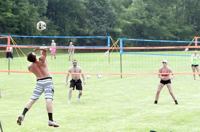 The Side-Out Foundation held its annual Rock the Pink grass doubles volleyball tournament at the Occoquan Regional Park with hundreds of players participating in the fundraising event. The goal was to raise $50,000 for breast cancer research.