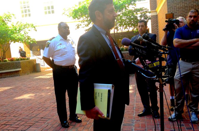 Police Chief Earl Cook and Commonwealth's Attorney Randy Sengel appear at a press conference shorty after chargers are filed against Craig Patterson.
