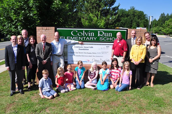 Members of Celebrate Great Falls present a donation to parents, students and staff from Colvin Run, Forestville and Great Falls Elementary Schools Tuesday, June 11. 