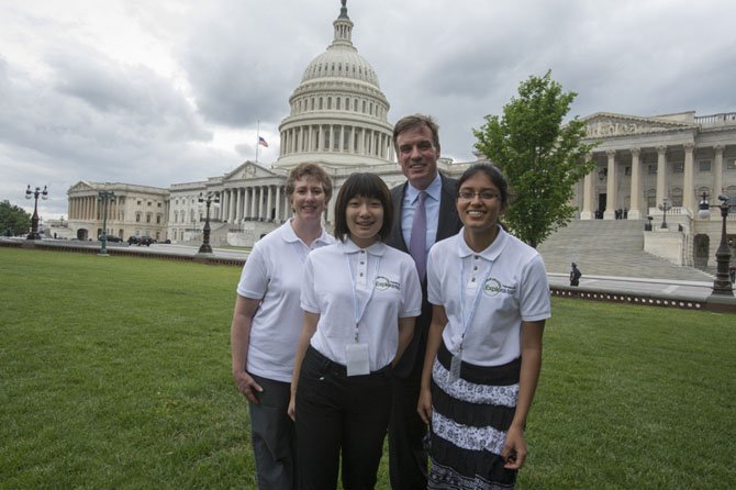 Coach Susan Bates, Joyce Tian, and Pallavi Bhave are pictured with Senator Mark Warner (D-VA) next to the Capitol Building in Washington, DC on Thursday, June 6th. The students entry "Food Allergen Detector" was the first place winner in the grades 7 through 9 group of the 2013 Toshiba/NSTA ExploraVision program.  ExploraVision is the worldâ€™s largest K-12 student science competition showcase.  More information can be found at www.exploravision.org