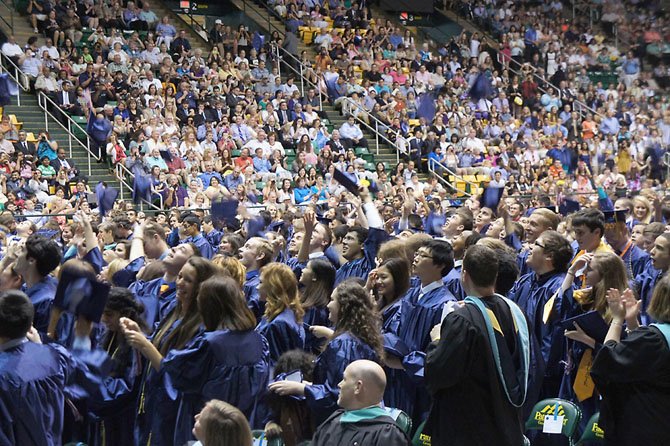 Graduates join in throwing their caps in the air to signal the end to a four years of high school at West Springfield, as well as the beginning of an exciting new chapter in their lives.
