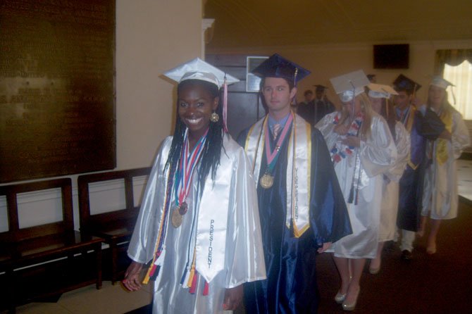 Anna Williams leads students into D.A.R. Constitution Hall for Edison High's graduation last Friday.