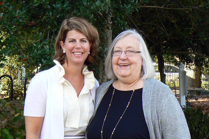 Retiring head Doris Cottam (right) with the new head Dr. Elinor Scully.