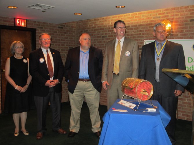 Vienna Rotarians Patricia Velkoff, George Creed, Jeff Bollettino, James Cudney and A. J. Oskuie were presented with the Paul Harris Fellow Awards for exceptional Rotary participation.