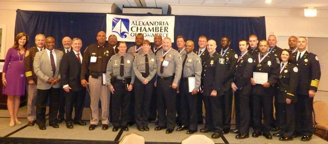 Police Chief Earl Cook, Sheriff Dana Lawhorne and Fire Chief Adam Thiel are joined onstage by Mayor Bill Euille, Chamber of Commerce CEO John Long, Chamber chairman John Renner and emcee Alison Starling for a photo with the 2013 Valor Awards honorees June 13 at the Crowne Plaza Hotel in Old Town.