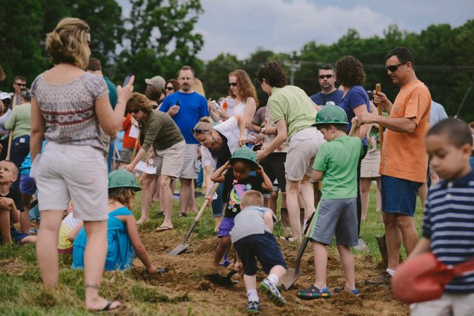 Congregation members of Christ United Methodist Church at the Sunday, June 2, groundbreaking ceremony for a new building, located on 7600 Ox Road in Fairfax Station.
