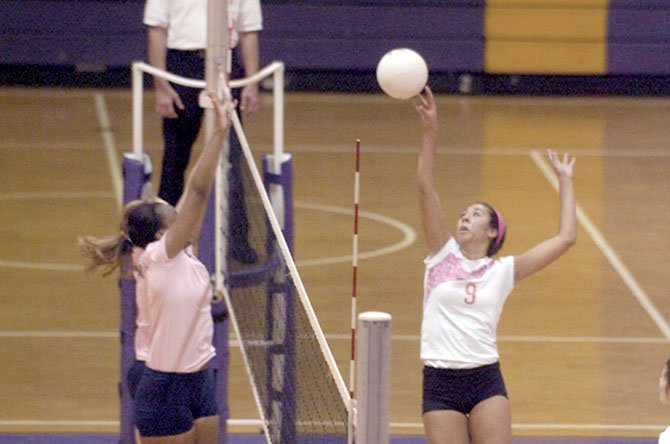 Former Lake Braddock volleyball player Kyra Rodi, right, will attend Hillsdale College in Michigan.