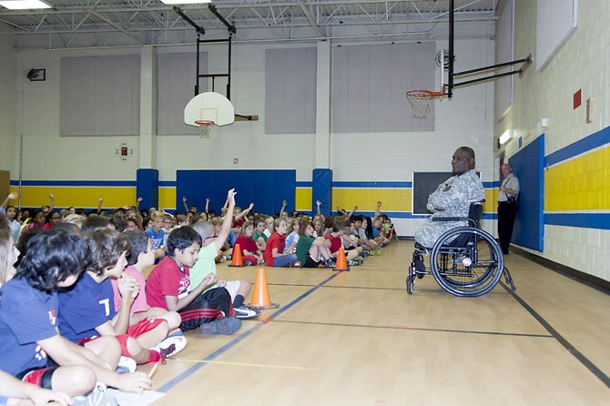 Col. Gregory D. Gadson answering questions from the fourth, fifth and sixth graders.