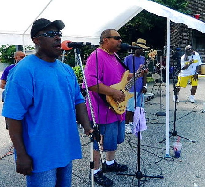  “Ain’t no love like my Savior’s love” harmonize Crowns of Life vocalists Leevere Peoples (left), the Rev. Steve Brown, Nate Bolds (in hat) and Ezekiel Raspberry Sr. Andrea Walker plays drums and (not pictured) Kenny Lockard performs lead guitar.
