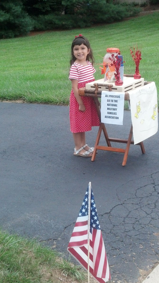 Selling Lemonade in Support of Purple Camps