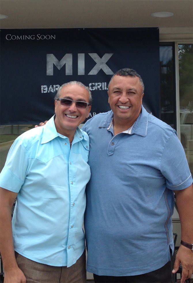 Eddie Benaim (left) with his partner Ramiro Paez.
