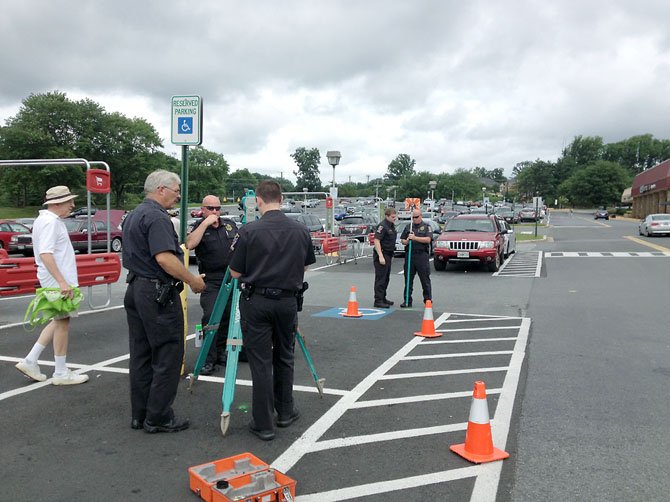 Detectives from the collision reconstruction unit worked last week on investigating the June 2 death at Cabin John Shopping Center.