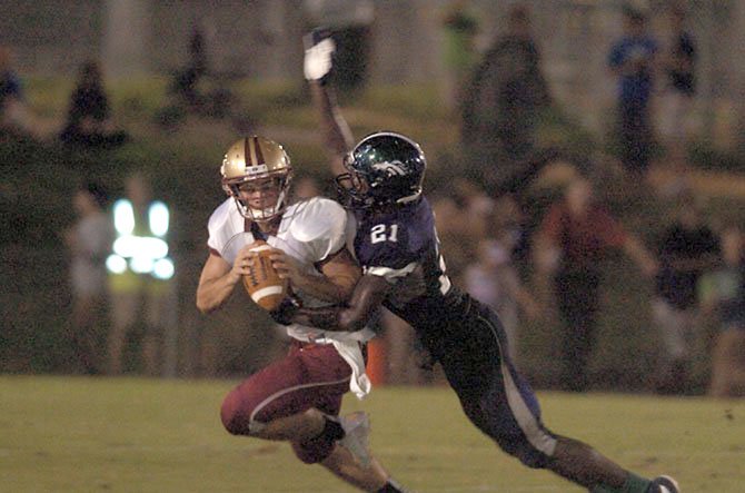 Oren Burks (right), a 2013 South County High School graduate, will play football at Vanderbilt University.