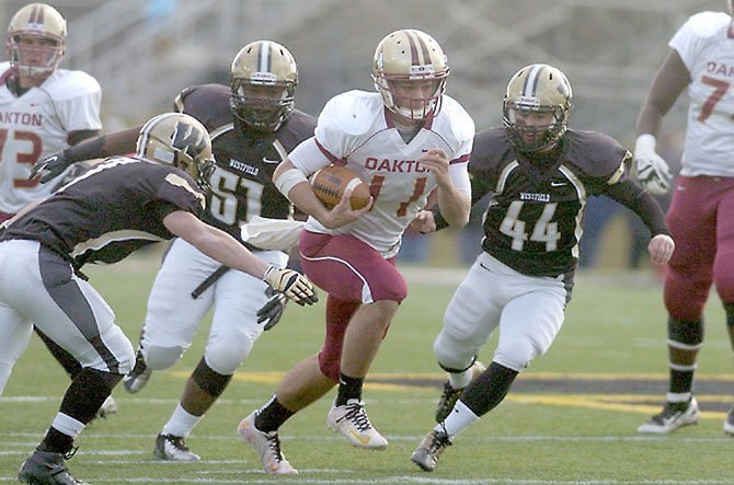 Kyle Downer (11), a 2013 Oakton High School graduate, will play football at the University at Albany.