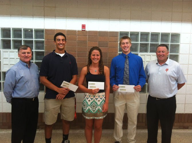 Fort Hunt Youth Athletic Association President Bob Burton with Jackson Casey Scholarship winners Alex Houser, Mary Patalita, John Schlesinger and Sean Casey. (Not pictured, Toni Stapleton.)
