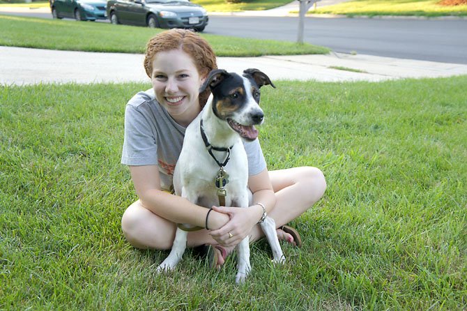 Eileen O’Connor of Burke takes “Ace” for a walk on a hot July evening.