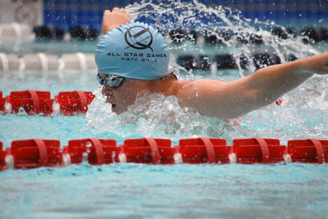 Lake Audubon's Griffin Scanlan outpaces the field to win the Boys (11-12) 50 meter Butterfly. 