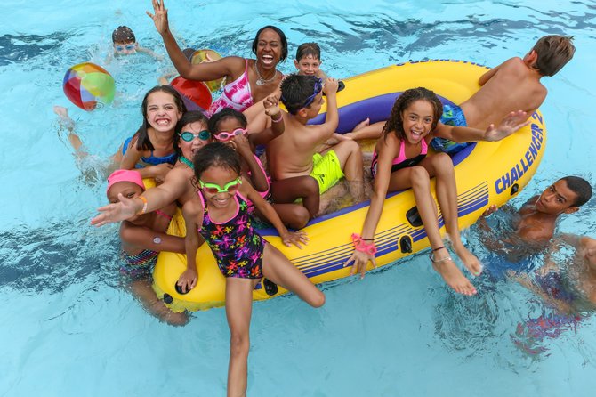Dental patients get out of the chair and into the pool for Dr. Tisseront's 11th annual Pool Party held on July 19 at Lake Newport Pool in Reston. 
