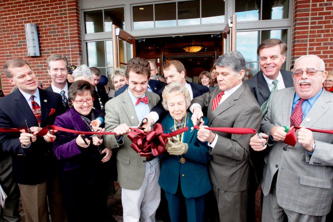 Geraldine Sherwood was surrounded by dignitaries during the ribbon-cutting ceremony at the grand opening celebration of the Stacy C. Sherwood Center in February 2011.