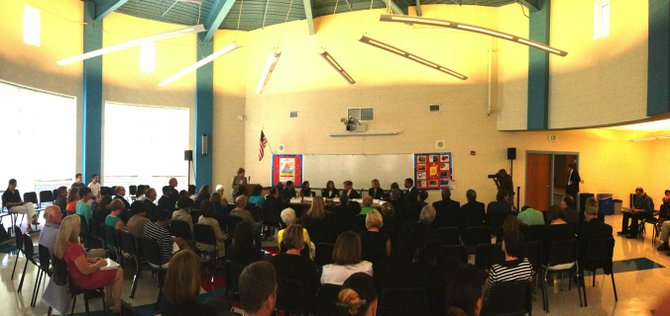 Republican Gov. Bob McDonnell, center, meets with Alexandria school officials during an educational summit at T.C. Williams High School as part of his “This Commonwealth of Opportunity” tour. 