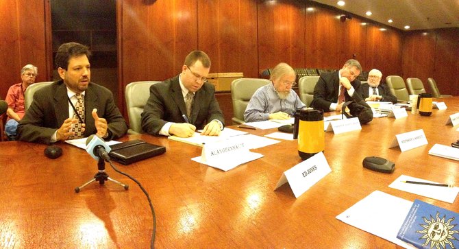 Del. Scott Surovell (D-44), left, presents his bill to members of the Rights and Responsibilities Subcommittee of the Freedom of Information Advisory Council. 