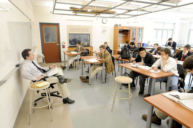 One hurdle that parents and students, like these Height School chemistry students, led by teacher Peter Bancroft, face when making the transition from a relaxed summer schedule to a demanding academic year is the mental preparation for the pace and discipline that school requires. 