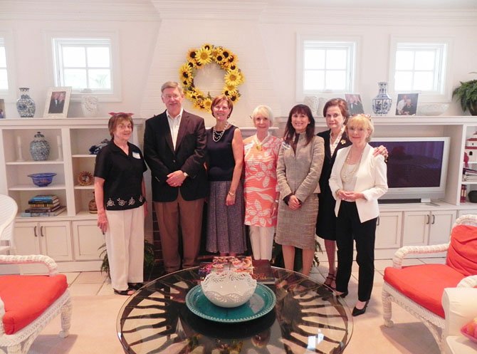 From left: Mildred “Millie” Thompson, Woman’s Club president; Supervisor John Foust (D- Dranesville), Honorary Tour Host Admiral Kathleen L. Martin, Mrs. Albert Rosecan and Dr. Karen Kierce, owners of homes on the 2013 Holiday Homes Tour; Woman’s Club Homes Tour Co-Chairmen Rosemarie Lazo and Jane Studabaker.
