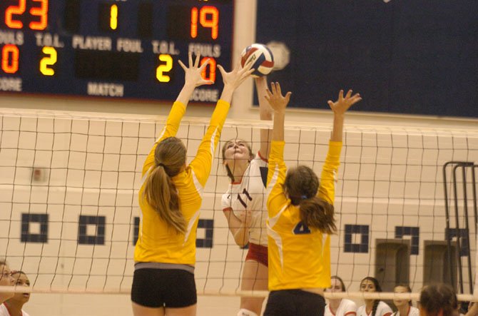 Woodson senior Eliza Fisher (11) finished with 31 kills against Robinson on Sept. 3.