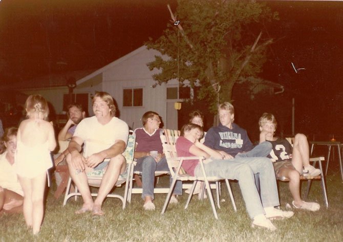 Kids and teens watch the “secret movie” in the 1960s and 1970s, the main event of the Dunn-Loring Woods annual block party, which celebrated its 51st anniversary Saturday, Sept. 7.
