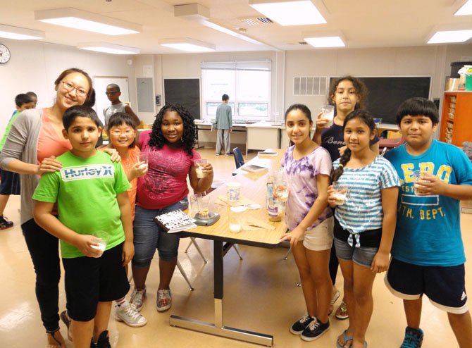 Teacher Lucia Park and some of the rising fifth- and sixth-graders who learned about estimation and measurement while making parfaits.
 
